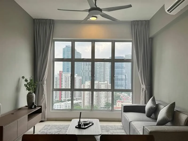 Living features: floor-to-ceiling windows, grey fabric sofa, coffee table, 3-blade ceiling fan, recessed downlights, light grey walls, curtains, wooden sideboard, decorative vase, area rug; style: modern; view: city.