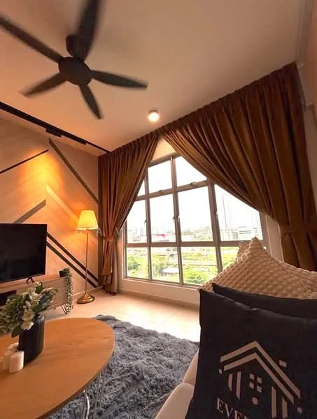Living features: 5-blade ceiling fan, floor-to-ceiling windows, brown curtains, wooden coffee table, grey area rug, TV console, wall-mounted TV, decorative plant, decorative pillows, accent wall with geometric pattern, lampshade floor lamp; style: modern; view: city.