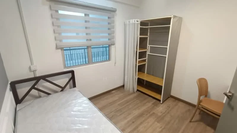 Bedroom features: single bed frame, mattress, wooden flooring, white painted walls, roller blinds on window, built-in wardrobe with open shelving, curtain for privacy, wooden chair; style: modern.