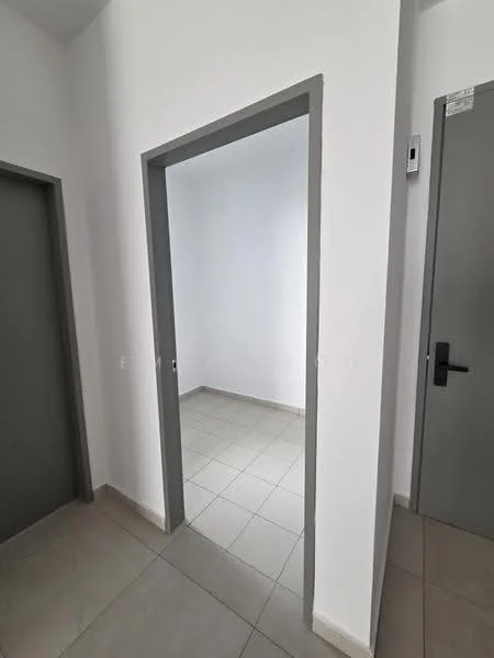 Room features: white painted walls, grey door frames, light grey tiled flooring, empty room, no visible furniture, doorway leading to another room, neutral color scheme, natural light from doorway; style: modern.