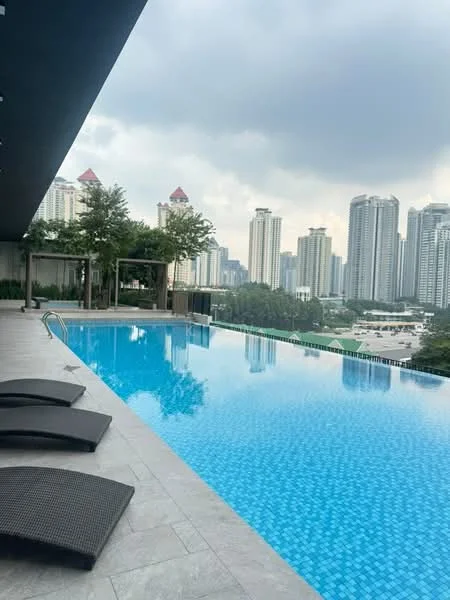 Exterior type: high-rise condominium; features: infinity pool, pool deck with loungers, tiled pool surface, surrounded by greenery, city skyline view, modern architecture, landscaped area, glass railing; style: modern.