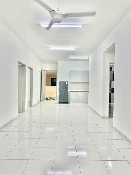 Room features: white painted walls, glossy white tile flooring, 5-blade ceiling fan with light, recessed LED downlights, built-in kitchen cabinetry in light color, stainless-steel fridge, open layout, large windows for natural light; style: modern.