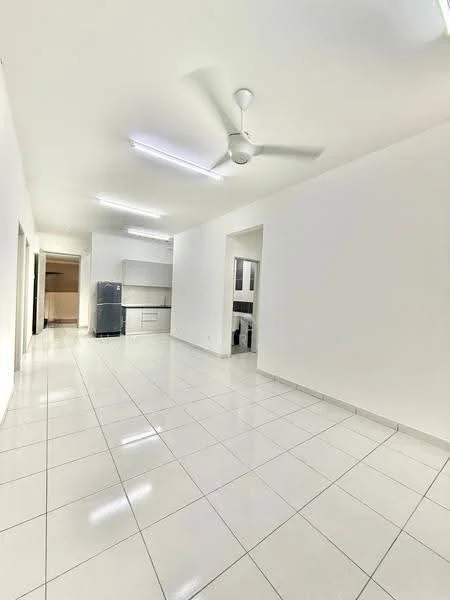 Room features: white painted walls, glossy white floor tiles, ceiling with recessed lighting, 5-blade ceiling fan, open layout, kitchen area visible in background, fridge visible, kitchen cabinetry visible; style: modern.