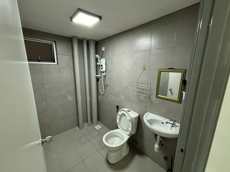 Bathroom features: grey tiled walls, grey tiled flooring, one-piece toilet, wall-mounted basin, chrome basin mixer faucet, shower with wall-mounted showerhead, mirror with decorative frame, exposed plumbing pipes, ceiling-mounted LED light; style: modern.