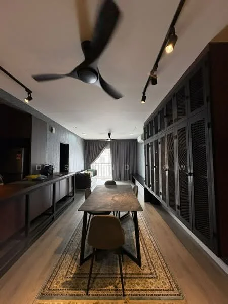 Dining features: wooden dining table, 4 upholstered dining chairs, area rug with geometric pattern, 5-blade ceiling fan with light, recessed LED downlights, grey curtains, dark wood cabinetry, open shelving, light wood flooring, wall-mounted TV, black accent wall; style: modern.