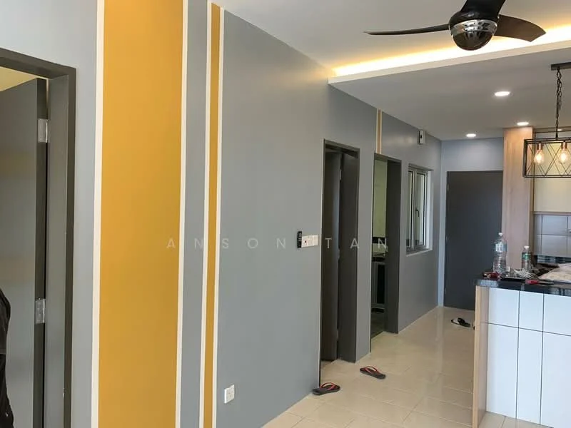 Room features: grey painted walls, yellow accent wall, white ceiling, recessed downlights, 5-blade ceiling fan, tile flooring, open doorway, window with view to outside, kitchen island with bar seating, water bottle on countertop; style: modern.