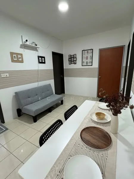 Living features: grey fabric sofa, white dining table, black dining chairs, ceramic plates, wooden serving board, white walls, cream accent wall, tile flooring, recessed ceiling lights, wall-mounted shelf, framed artwork, wooden door, black door frame; style: modern.