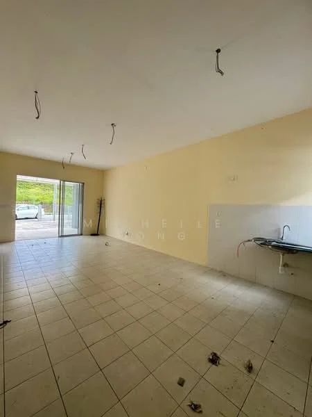 Room features: light beige painted walls, white tiled flooring, sliding glass door, kitchenette with sink, exposed electrical wiring, no visible furniture, large open space, natural light from sliding door.