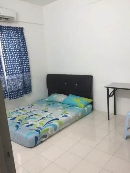 Bedroom features: queen-size bed with upholstered headboard, bedding with floral pattern, white painted walls, tiled flooring, window with blue patterned curtains, study desk, plastic chair, air conditioning unit on wall; style: minimalist.