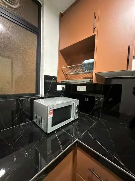 Kitchen features: black marble countertop, brown cabinetry, microwave, dish rack, black tiled backsplash, under-cabinet lighting, single-bowl stainless-steel sink, wall-mounted electrical outlets; style: modern.
