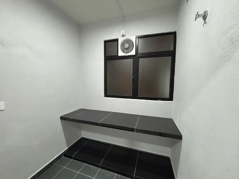 Room features: grey tiled flooring, white painted walls, black countertop, single window with black frame, wall-mounted air conditioning unit, shelf or bench area; style: modern.
