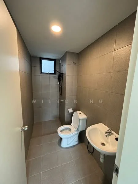Bathroom features: grey tiled walls, light grey tiled flooring, one-piece toilet, wall-mounted basin, chrome faucet, window for natural light, shower head on wall, toilet paper holder; style: modern.