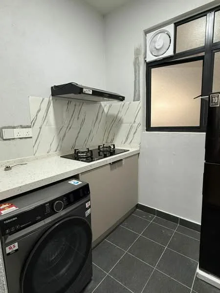 Kitchen features: grey and white marble-patterned backsplash, white countertop, built-in gas hob with two burners, black range hood, dark cabinetry, black washing machine, black refrigerator, single window with frosted glass, grey floor tiles; style: modern.