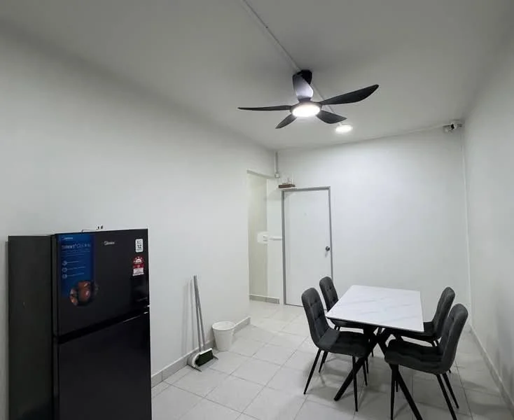 Dining features: white painted walls, tile flooring, 5-blade ceiling fan with light, rectangular dining table with white top, 4 upholstered dining chairs in grey, black refrigerator, door leading to hallway, light fixtures on ceiling; style: modern.