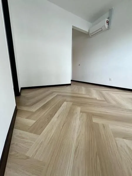 Room features: laminate flooring in light wood finish, white painted walls, black trim along the baseboards, wall-mounted split AC unit; style: modern.
