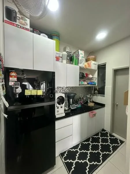 Kitchen features: black and white cabinetry, black countertop, stainless-steel fridge, built-in oven, microwave, kettle, blender, sink, wall-mounted shelves, tile flooring, decorative rug with geometric pattern, white tiled backsplash; style: modern.
