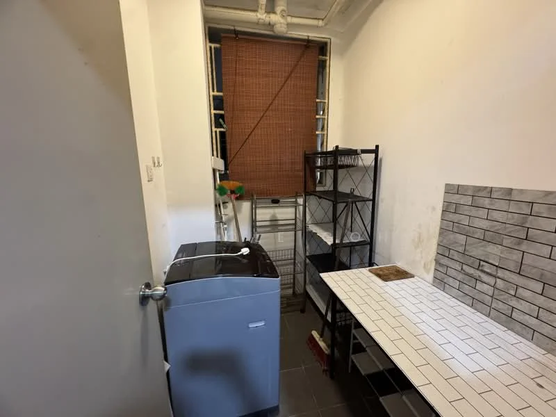 Laundry features: top-load washing machine, metal shelving unit, white tiled countertop, grey tiled flooring, exposed pipes, window with bamboo blinds, wall-mounted drying rack.