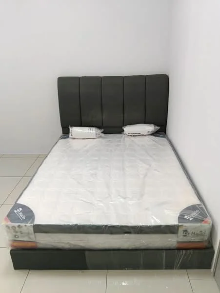 Bedroom features: queen-size bed, upholstered headboard in grey, white bedding, two pillows, tile flooring, plain white walls, minimalist decor; style: modern.
