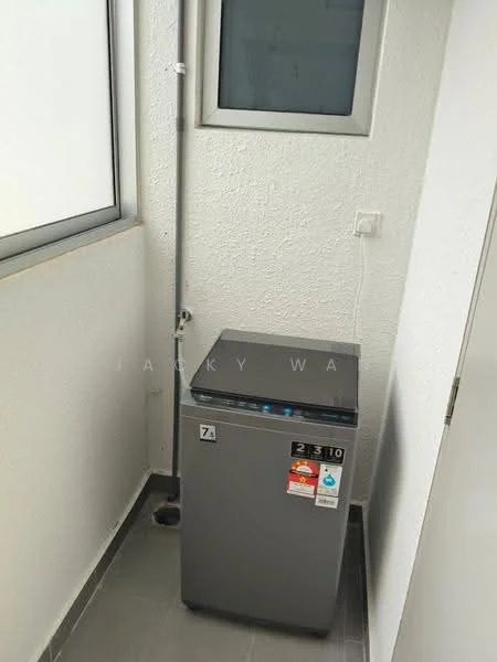Laundry features: grey washing machine, small window, white painted walls, grey tile flooring, plumbing pipe, electrical outlet.