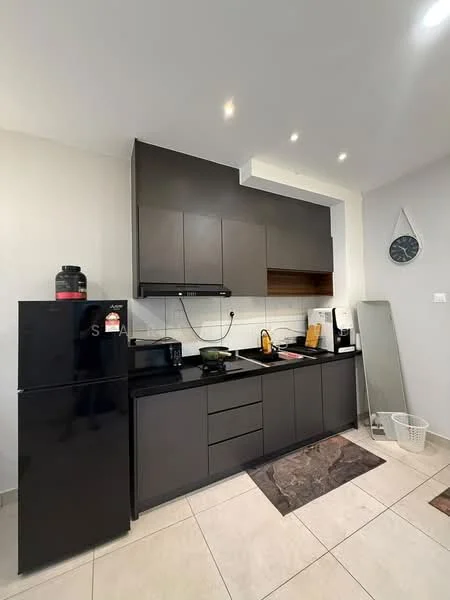Kitchen features: black cabinetry, white tiled backsplash, black countertop, stainless-steel sink, chrome pull-down faucet, built-in stove with hood, black refrigerator, microwave, kettle, toaster, wall clock, mirror, tile flooring, recessed downlights; style: modern.