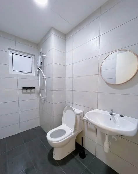 Bathroom features: white tiled walls, grey tiled flooring, one-piece toilet, wall-mounted shower with handheld showerhead, round mirror, sink with chrome faucet, window for natural light, wall-mounted towel rack; style: modern.
