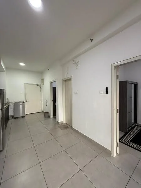 Room features: white painted walls, grey tiled flooring, recessed ceiling lights, doorway leading to another room, doorway leading to a closet, metal cabinet, laundry area with washing machine, hallway with no visible decor; style: modern.