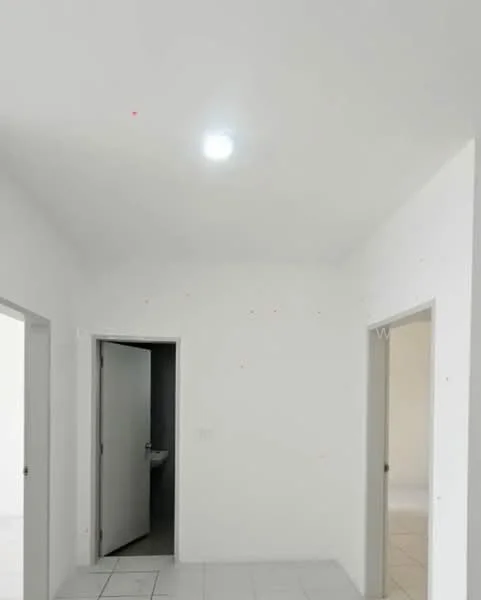 Room features: white painted walls, flat ceiling, recessed ceiling light, light-colored tiled flooring, two doorways, one doorway leading to a bathroom; style: minimalist.