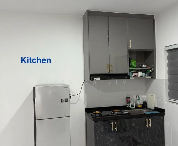 Kitchen features: grey upper cabinets, black lower cabinets, black countertop, stainless-steel fridge, 2-burner gas hob, stainless-steel sink, wall-mounted shelf, green dish rack, white tiled backsplash, window with horizontal blinds; style: modern.