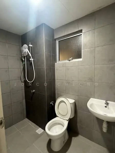 Bathroom features: grey ceramic tile walls, light grey ceramic tile flooring, walk-in shower with glass partition, overhead shower, toilet with white ceramic finish, small white sink, window with frosted glass, shower head with adjustable height; style: modern.