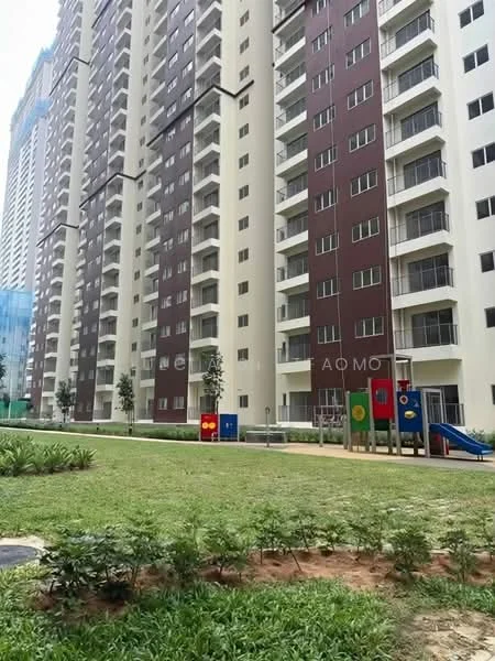 Exterior type: high-rise condominium; features: multi-storey building, green lawn area, children's playground, landscaped garden, balconies on upper floors, glass windows, decorative wall panels, play equipment, surrounding greenery; style: modern.