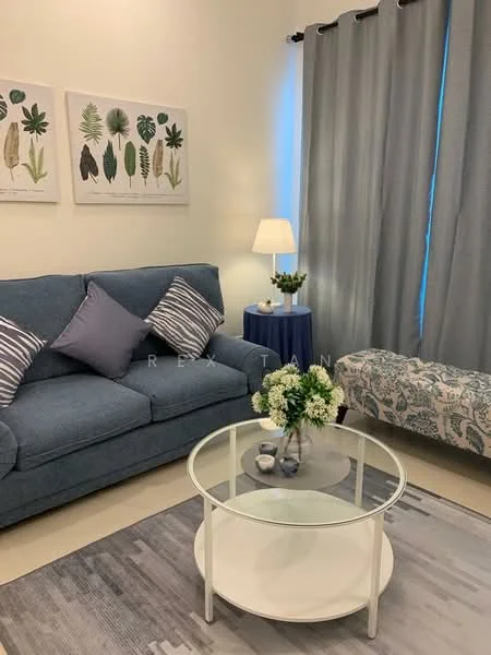 Living features: blue fabric sofa with decorative cushions, round glass coffee table, area rug with geometric pattern, floor lamp with white shade, blue side table, framed botanical artwork on walls, curtains in grey fabric, decorative plant on side table, upholstered bench with floral pattern; style: modern.