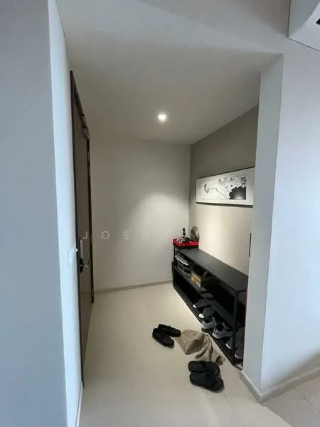 Room features: light grey painted walls, cream tiled flooring, recessed ceiling light, black console table, decorative artwork on wall, slippers on floor, shoes on floor; style: modern.