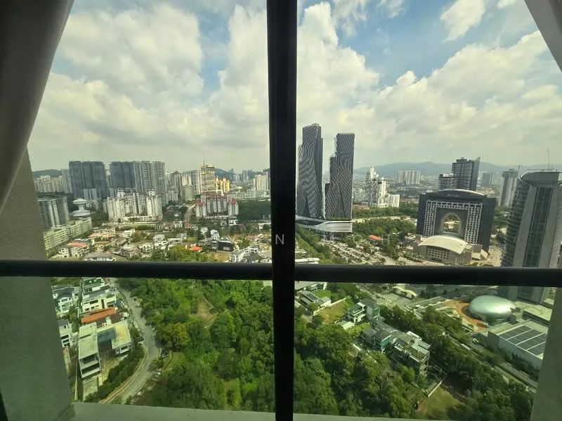 Exterior type: high-rise condominium; features: city skyline view, surrounded by greenery, modern architecture, multiple high-rise buildings, urban landscape, clear blue sky, clouds, visible roads and pathways; style: modern.