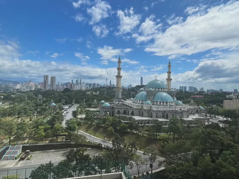 Exterior features: city skyline in background, large mosque with blue domes, tall minarets, surrounding greenery, urban landscape, clear blue sky with clouds; style: modern.