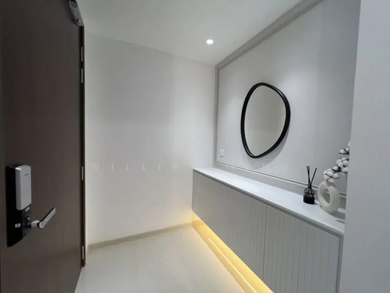 Room features: white painted walls, light-colored flooring, built-in console with LED lighting, round mirror, decorative vase, minimalist decor, wall-mounted electrical outlet, door with modern handle; style: modern.