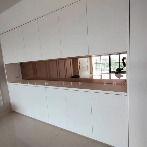 Kitchen features: white cabinetry, flat-panel cabinets, mirrored backsplash, smooth countertop, high-gloss finish, built-in storage, open shelving, large window for natural light, polished tile flooring; style: modern.