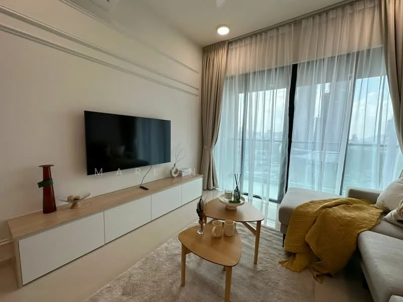 Living features: floor-to-ceiling windows, sheer curtains, light-coloured walls, cream carpet flooring, light wood TV console, wall-mounted TV, beige L-shape sectional sofa, round coffee table, decorative vase, throw blanket, decorative plant, wall-mounted air conditioning unit, recessed downlights; style: modern; view: city.