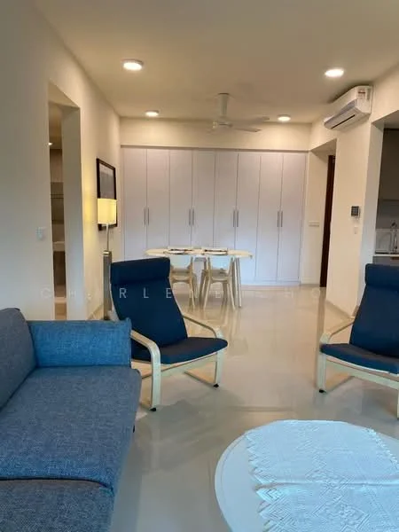 Living features: 3-seater fabric sofa in blue, 2 armchairs with wooden frames, round coffee table, recessed downlights, white painted walls, glossy tile flooring, ceiling fan, built-in cabinetry with white finish, dining table with 4 chairs visible in background, air conditioning unit on wall; style: modern.