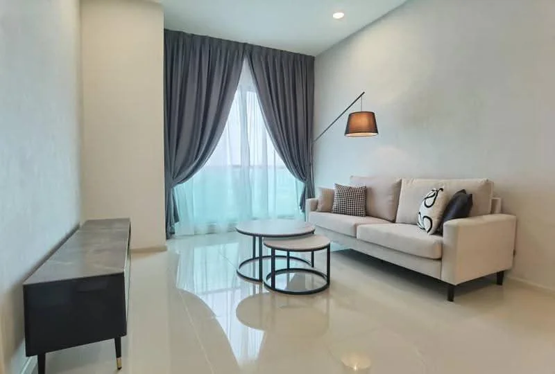 Living features: cream painted walls, glossy tile flooring, floor-to-ceiling windows, sheer curtains, dark grey curtains, 3-seater fabric sofa in light beige, decorative throw pillows, round coffee table with black metal base, TV console with marble top, wall-mounted lamp, area rug with geometric pattern; style: modern; view: city.
