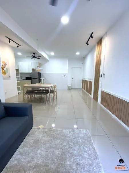 Living features: grey fabric sofa, area rug with geometric pattern, dining table with four chairs, recessed LED downlights, 5-blade ceiling fan, white painted walls, cream tiled flooring, wood panel accent wall, open layout to kitchen, sliding door to hallway; style: modern. Kitchen features: white cabinetry, stainless-steel fridge, built-in oven, 4-burner gas hob, white backsplash, open shelving, countertop with bar seating; style: modern.