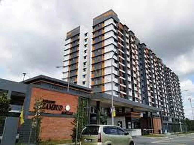 Exterior type: mid-rise condominium; features: grey painted facade, brick cladding at entrance, balconies with metal railings, multiple storeys, landscaped entrance, parking area visible, signage at entrance, surrounded by greenery; style: modern.