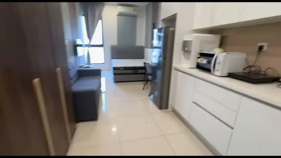 Kitchen features: white cabinetry, stainless-steel fridge, built-in microwave, ceramic cooktop, white countertop, tile backsplash, single-bowl stainless-steel sink, chrome pull-down faucet, recessed downlights, cream tiled flooring, open shelving, wall-mounted TV, grey sofa, dining table with chairs; style: modern.