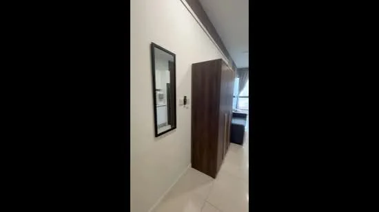 Room features: white painted walls, mirror, wooden wardrobe, tile flooring, window with curtain, neutral color scheme; style: modern.