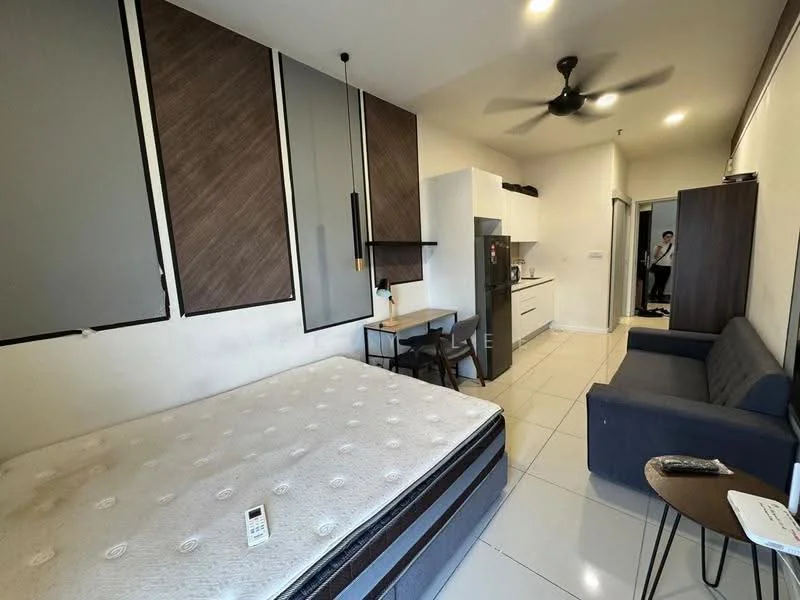 Room features: queen-size bed, upholstered headboard, 2 bedside lamps, sofa in grey fabric, coffee table, wall-mounted TV, kitchenette with white cabinets, stainless-steel fridge, 4-burner gas hob, exposed ceiling with ceiling fan, tile flooring, white painted walls, dining table for 2, open shelving; style: modern.