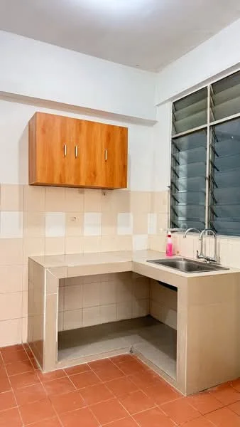 Kitchen features: single-bowl stainless-steel sink, chrome pull-down faucet, laminate countertop, wall-mounted wooden cabinet with two doors, white tiled backsplash, cream tiled walls, red ceramic tile flooring, window with horizontal sliding panes; style: modern.