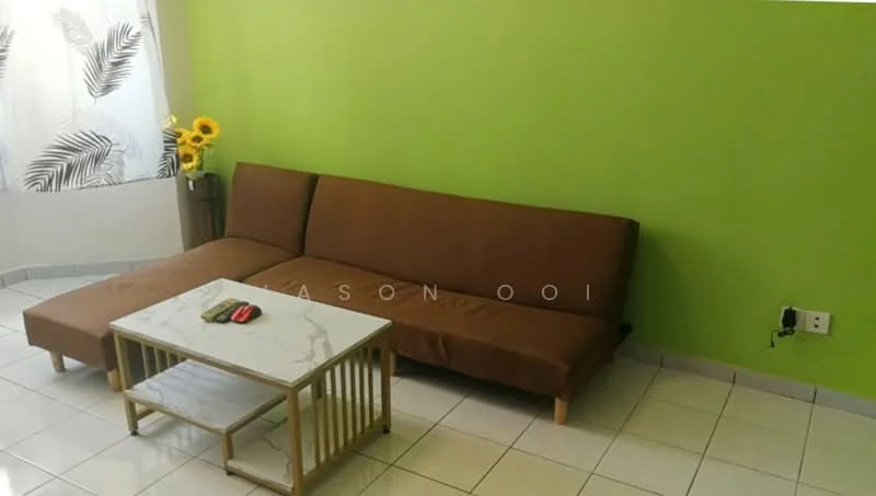 Living features: brown fabric sectional sofa, white marble-top coffee table, green painted walls, white tiled flooring, floor-to-ceiling window with sheer curtains, decorative sunflowers in vase, electrical outlet on wall; style: modern.