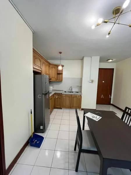 Kitchen features: wood cabinetry, white countertop, stainless-steel fridge, built-in sink, chrome pull-down faucet, ceramic tile flooring, pendant light fixture, dining table with chairs, wall-mounted cabinets, open layout, white walls, recessed lighting; style: modern.
