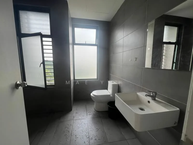 Bathroom features: grey tile flooring, grey tiled walls, white wall-mounted sink, chrome basin mixer faucet, one-piece toilet, large mirror, two windows, sliding window, black waste bin; style: modern.