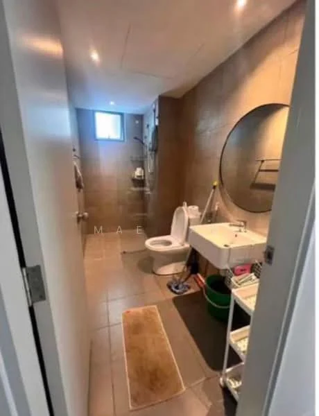 Bathroom features: white toilet, single-sink vanity with square basin, mirror with round frame, shower area with glass partition, chrome shower head, tile flooring, brown wall tiles, white wall tiles, towel rack, small rug, storage cart, window for natural light; style: modern.