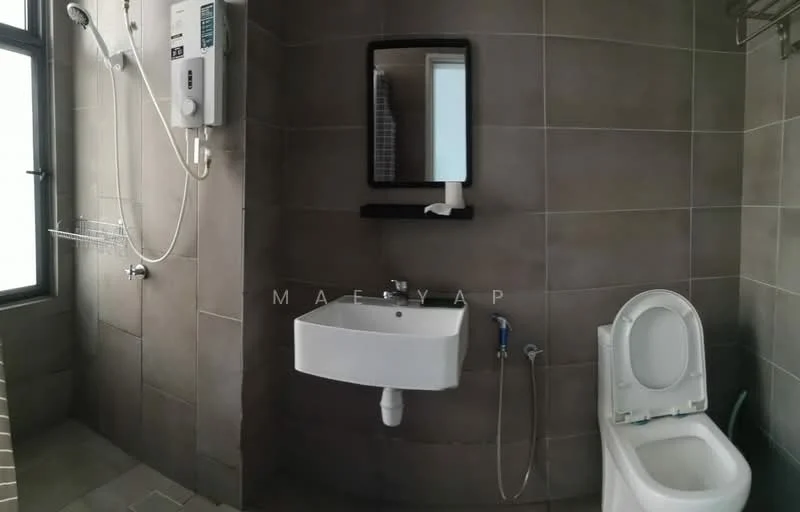 Bathroom features: grey tiled walls, grey tiled flooring, white wall-mounted sink, chrome faucet, framed mirror, one-piece toilet, shower with handheld showerhead, water heater unit, towel rack, window for natural light; style: modern.